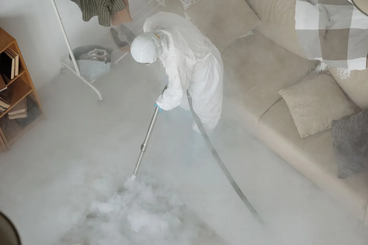 Biohazard cleanup technician in protective equipment, Evanston, Cincinnati, OH
